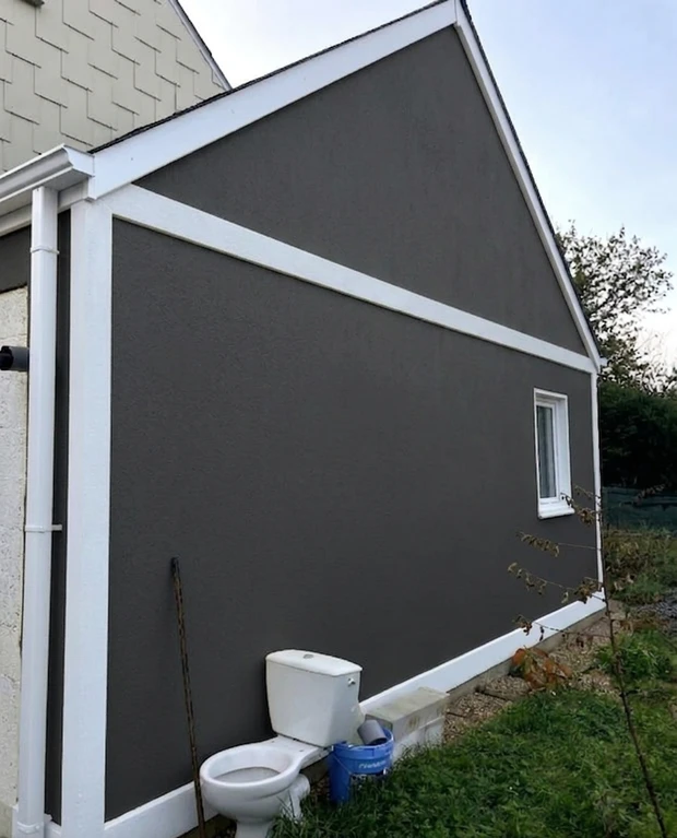 After — facade in Dark Charcoal (RAL 7021) with Bright White on the trim (Modern)