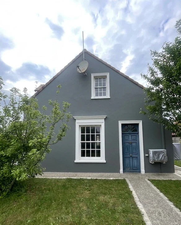 House facade in Down Pipe (Farrow & Ball No. 26) after AI colour preview
