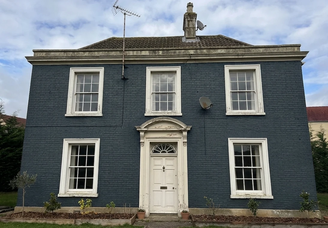 House facade in Hague Blue (Farrow & Ball No. 30) after AI colour preview