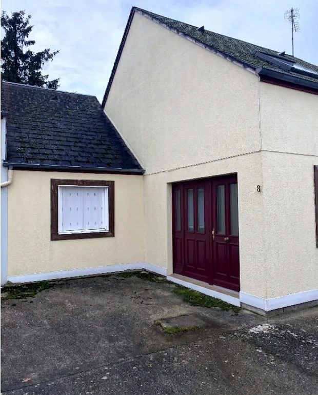 Before — facade without Warm Cream + Deep Burgundy (Traditional)