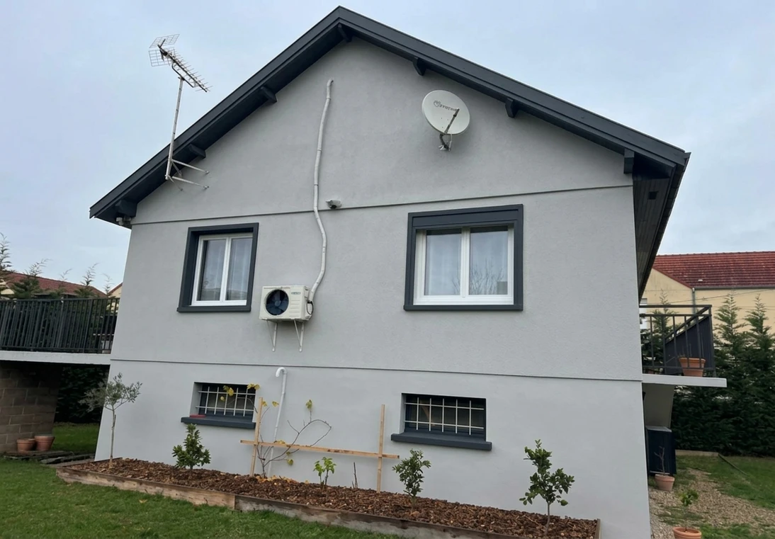 After — facade in Silver Gray (RAL 7038) with Charcoal on the trim (Contemporary)