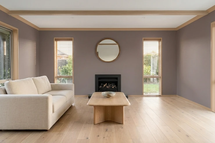 After - facade in Cinnamon Slate (Benjamin Moore Cinnamon Slate 2113-40) with Natural Oak on the built-in shelving, trim and exposed beam (Organic Modern)