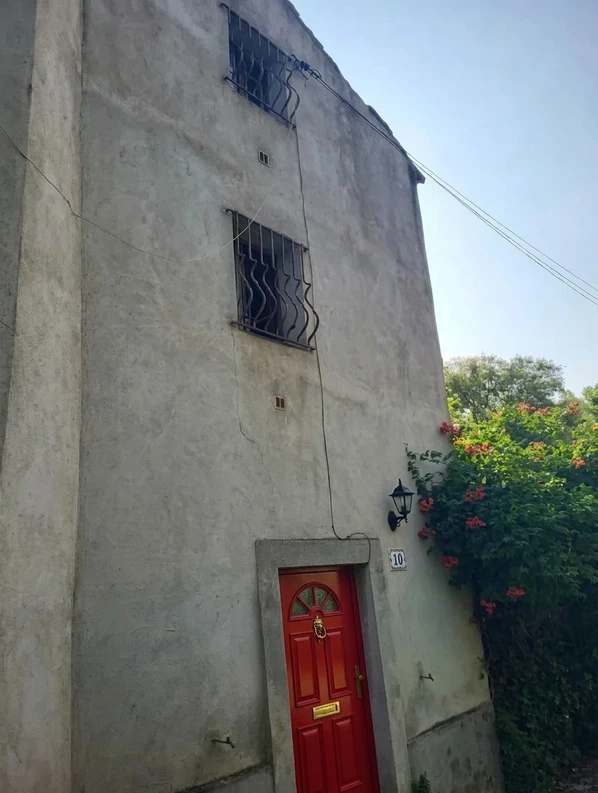 Before — facade without Brilliant White + Pillar Box Red (Iconic British)