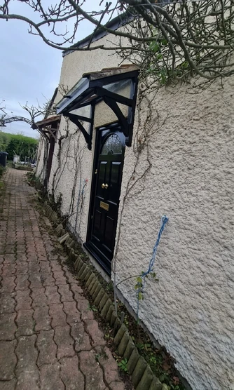 Before — facade without Buttercup Yellow + Jet Black (Regency)