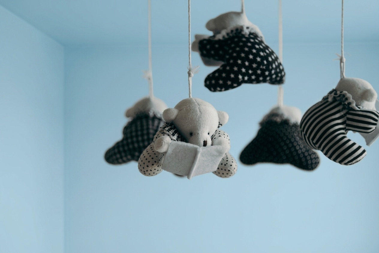 After - facade in Sky Pastel Blue (SW 6505 Atmospheric) with Alabaster White on the ceiling, crown molding, baseboards, window casings (Genderless Modern Nursery)